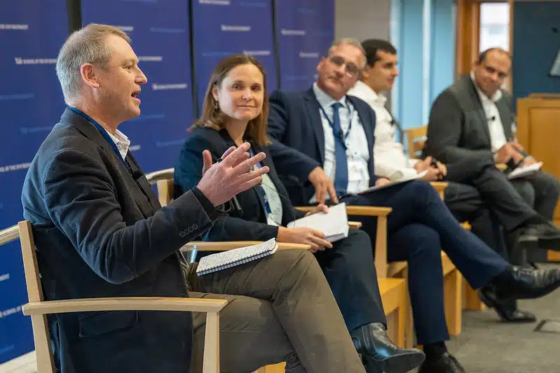 Carl Obst (left) talking on the panel