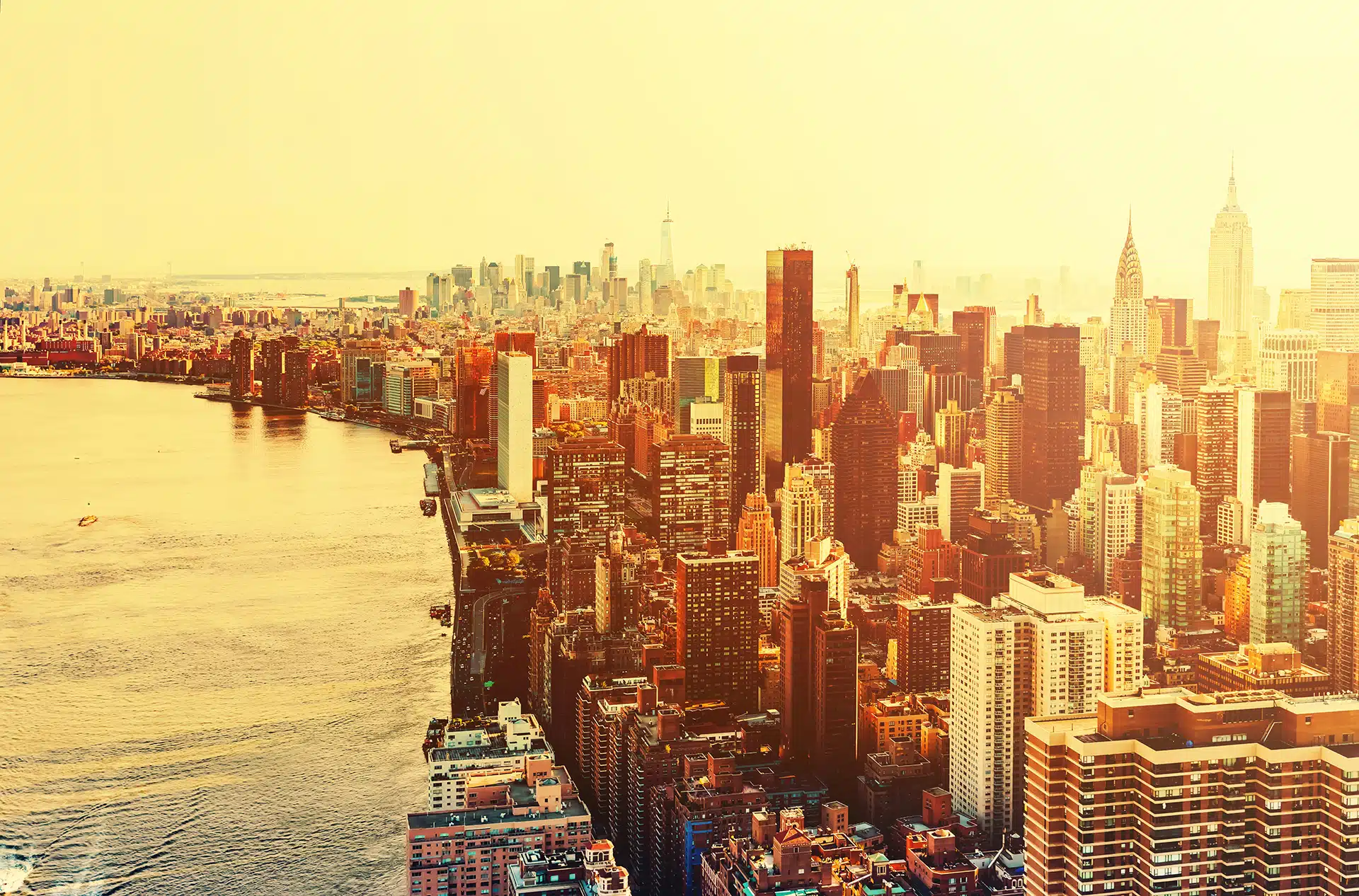 Aerial view of the New York City skyline near Midtown at sunset re Capitals Coalition launches new Beta Framework for Integrated Decision-Making