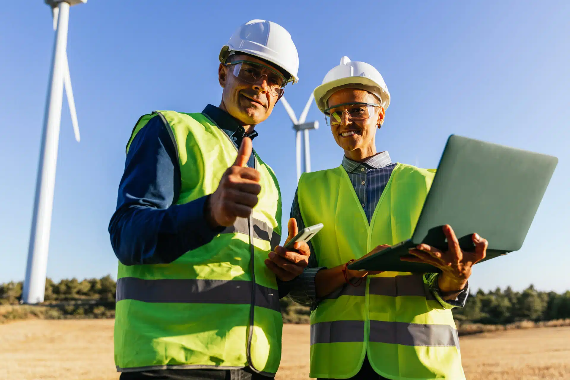 Two engineers in the field at a wind farm. Natural Capital Accounting Design and Implementation Protocol