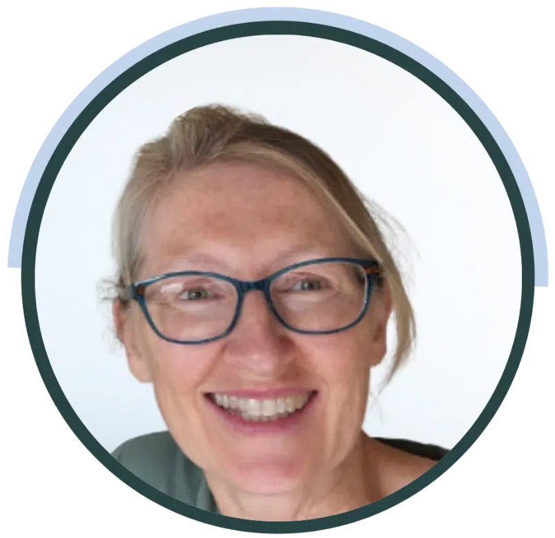 Michelle Butler, ideea group team member, smiling in glasses