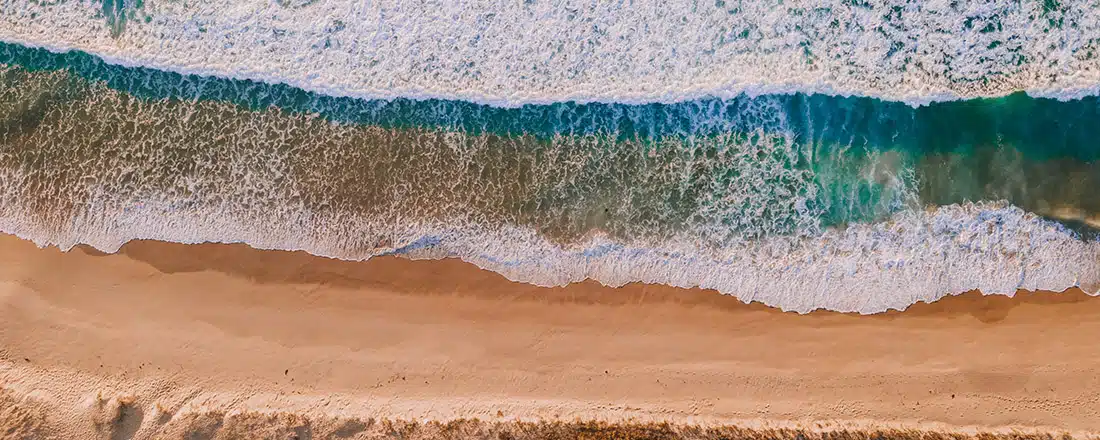 Aerial view of a beach for Modelling and measuring natural capital for NSW oceans with Blue Impact Bonds