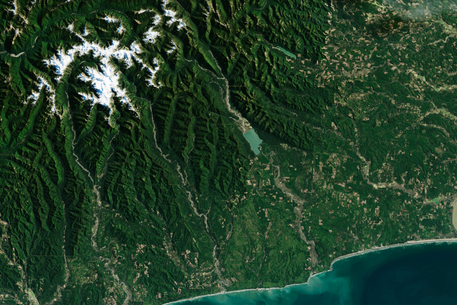 An aerial view of mountains and coastline