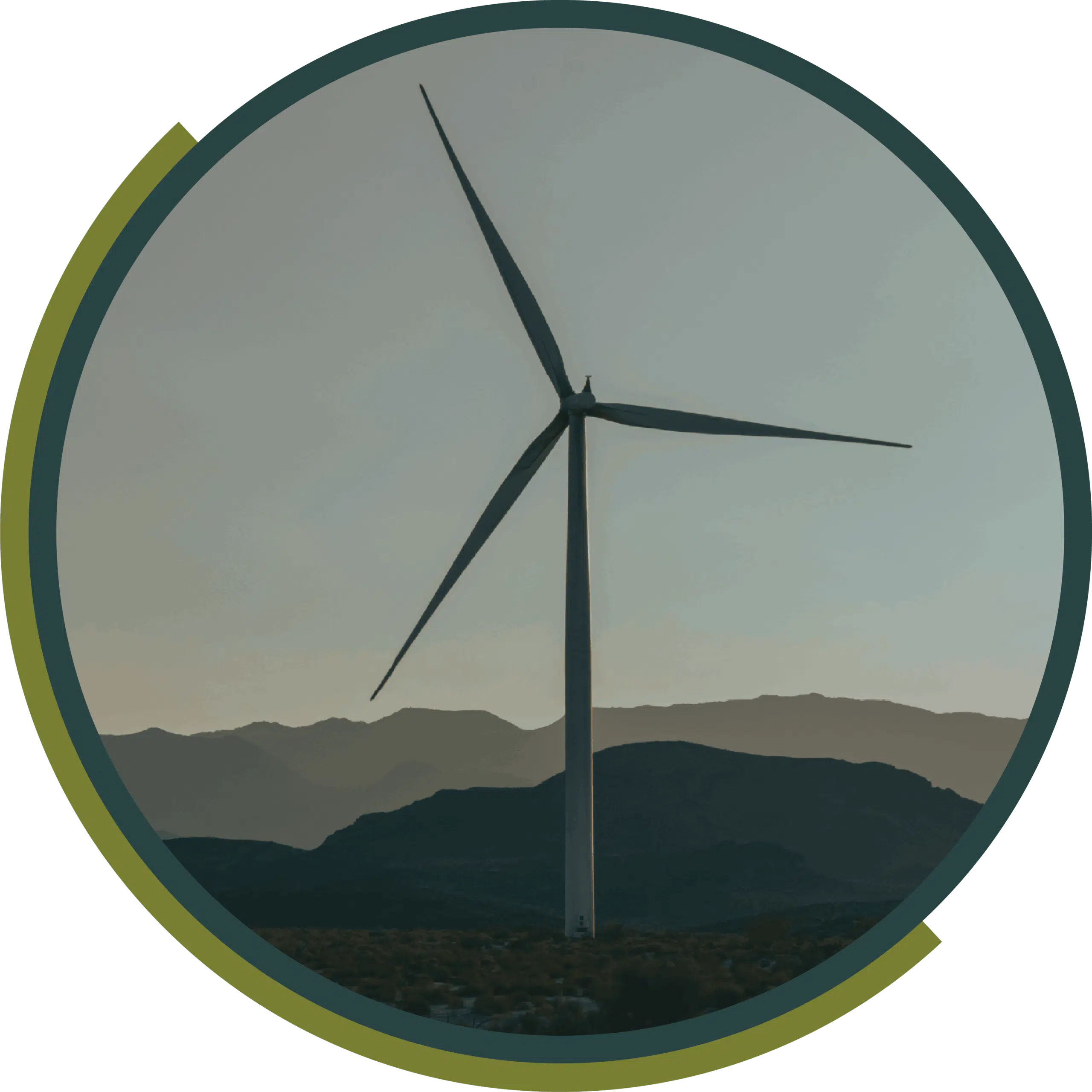 Wind turbine standing on a ridge against a hazy sky