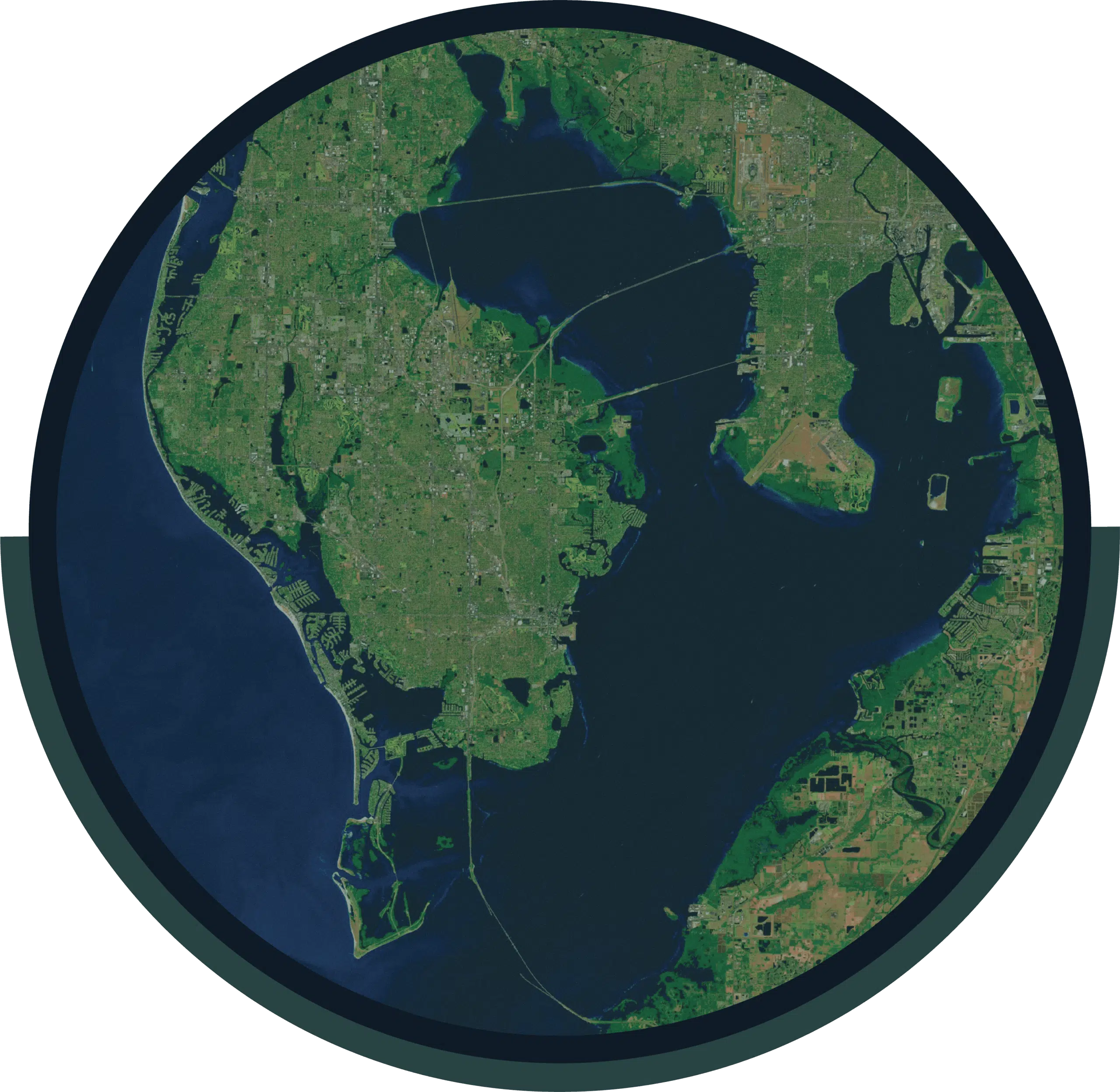 Satellite view of a green peninsula surrounded by dark water