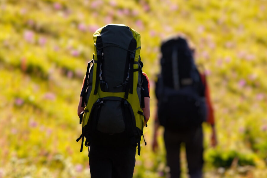 Two people hiking for turning to nature in uncertain times